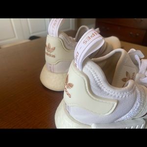 White and gold Adidas tennis shoes